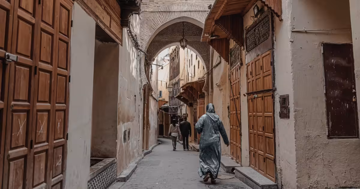 Historic medina of Fez with narrow streets and traditional riads in Morocco.