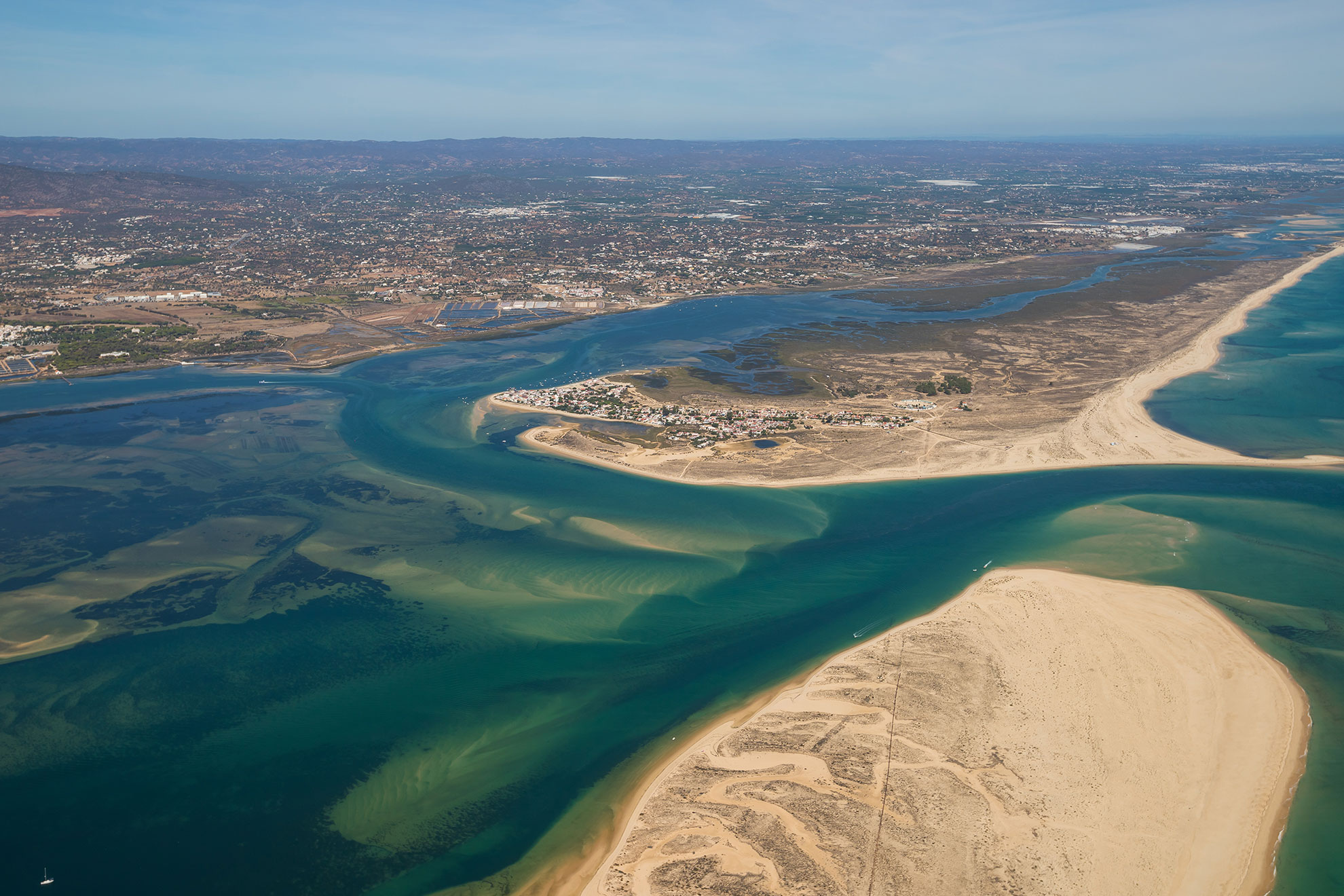 Aerial view of Ria Formosa Natural Park lagoon channels near Faro Portugal.