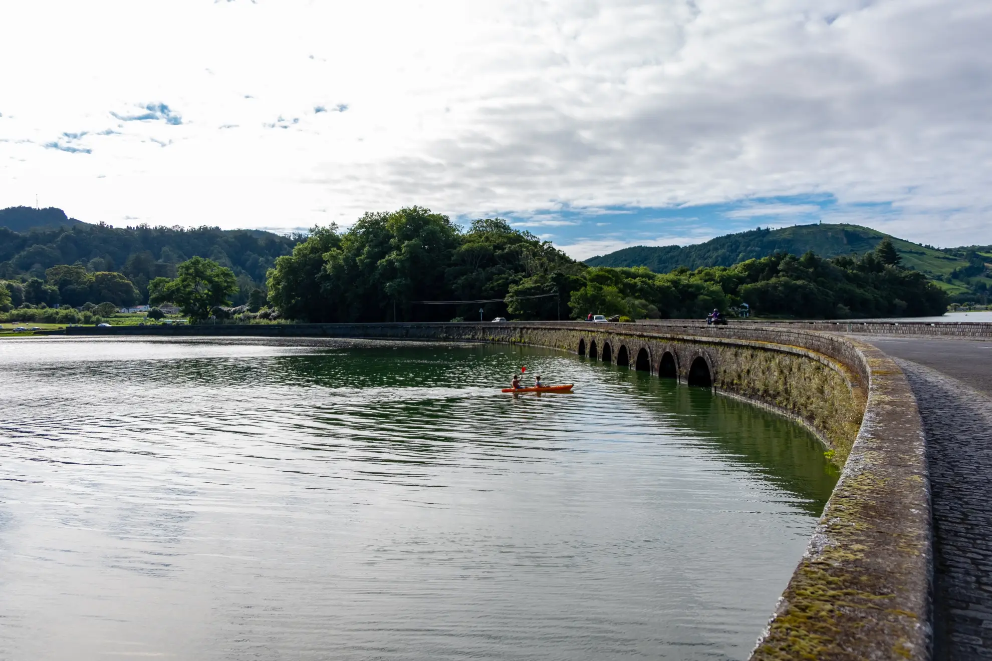 View from kayak under the stone bridge dividing Lagoa Azul and Lagoa Verde, Sete Cidades.