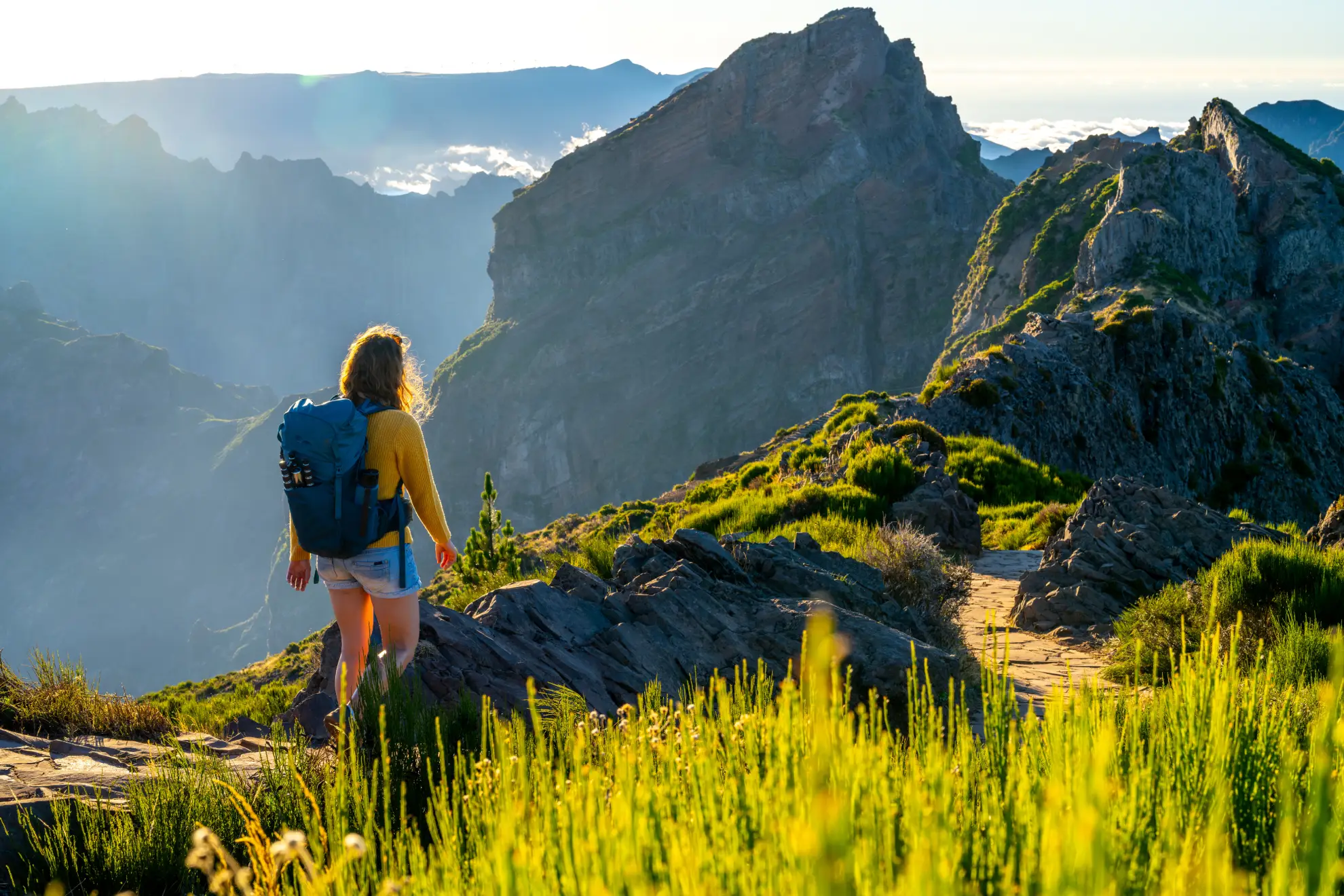 Volcanic peaks of eastern Madeira rising above a sea of clouds at Pico do Arieiro.