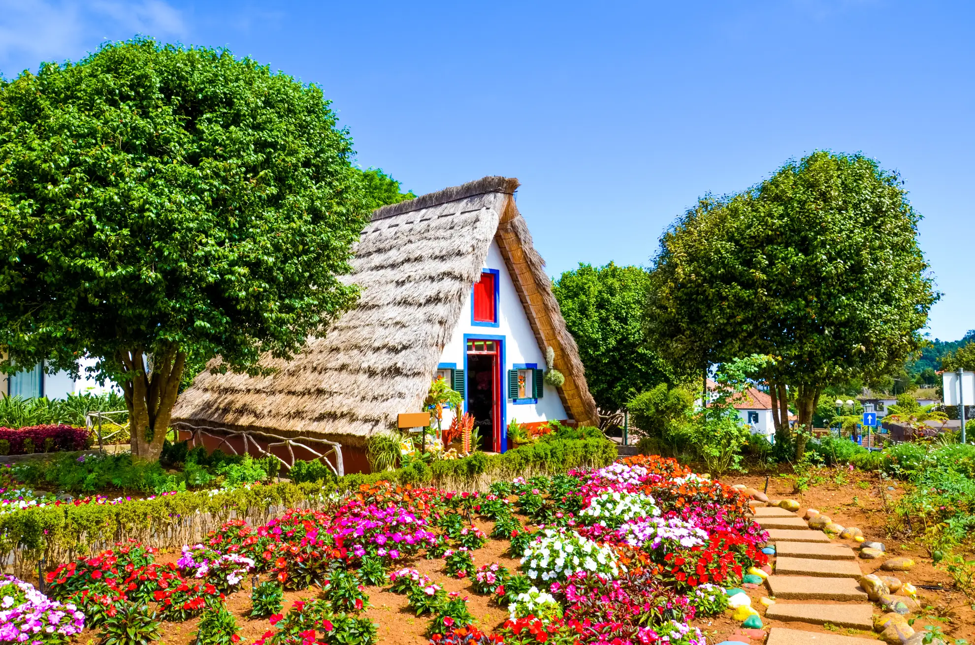 Traditional thatched palheiro house in Santana village northeastern Madeira.