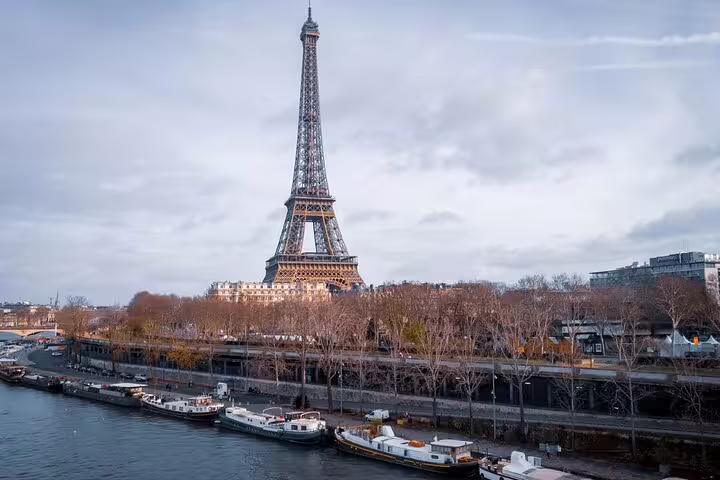 Paris City Tour with Seine River Lunch Cruise and Galeries Lafayette