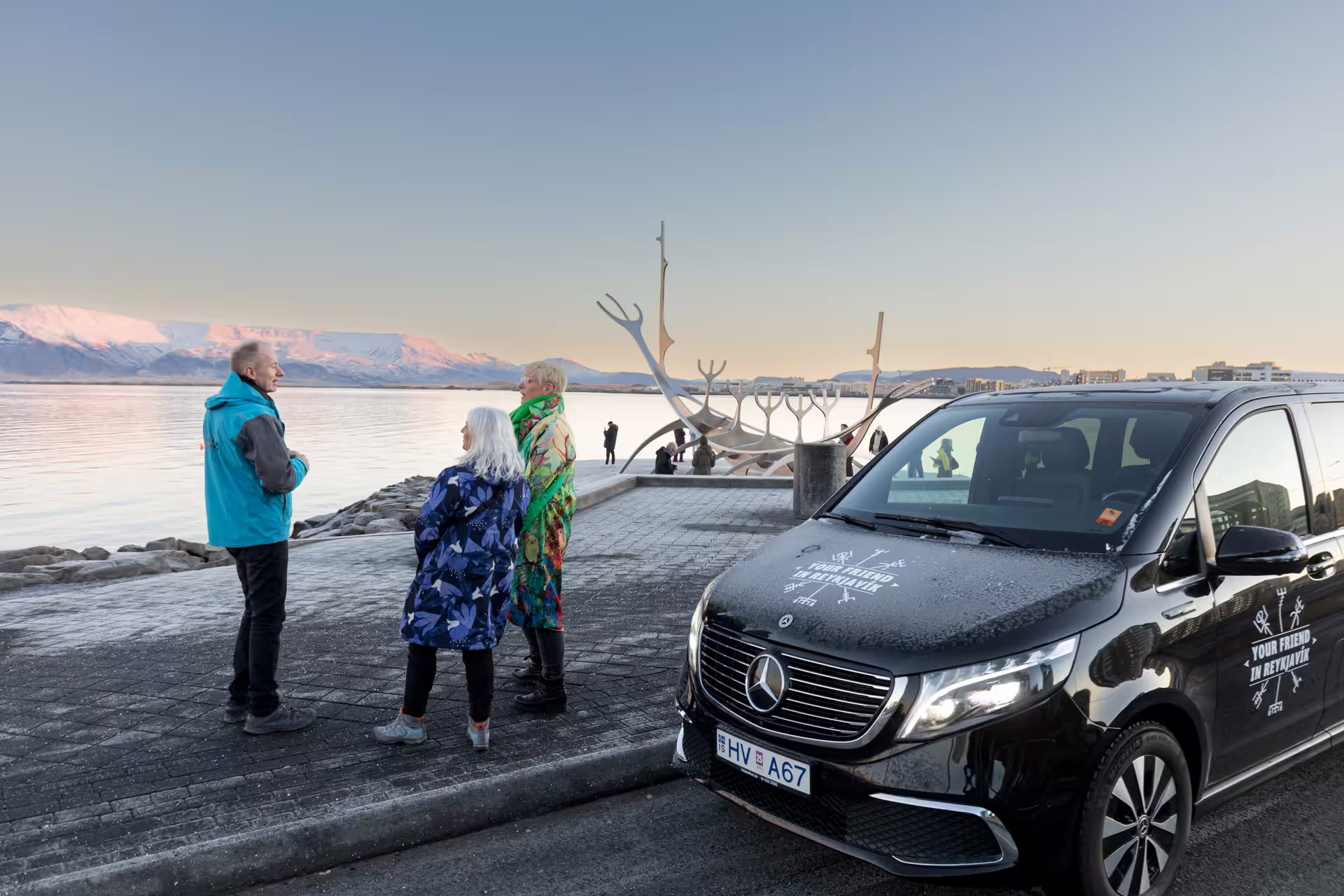 Private driving tour in Reykjavík — Perlan observation deck and Grotta Lighthouse viewed from a vehicle tour
